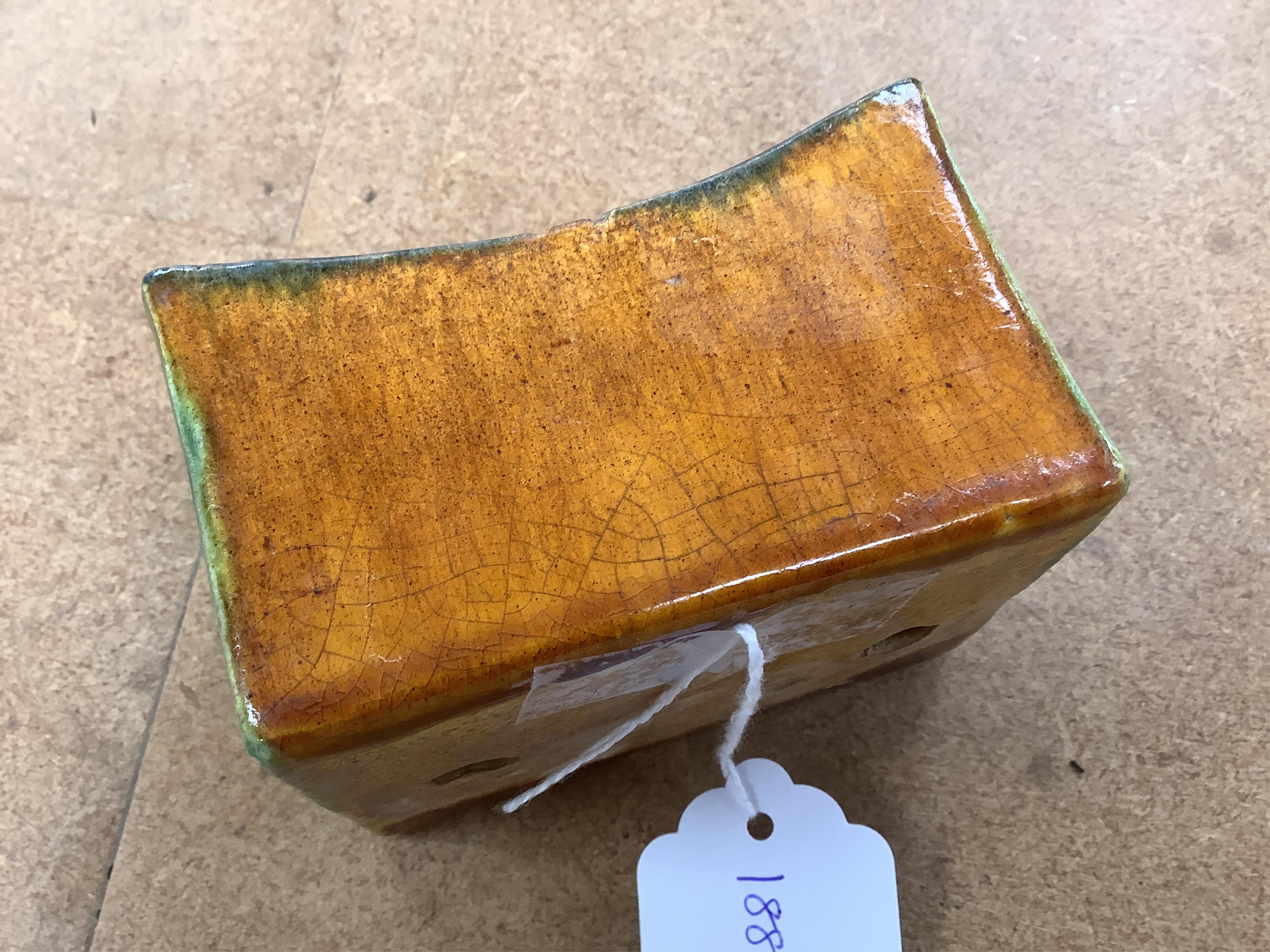 A Chinese stone ware arm rest, 10cm wide
